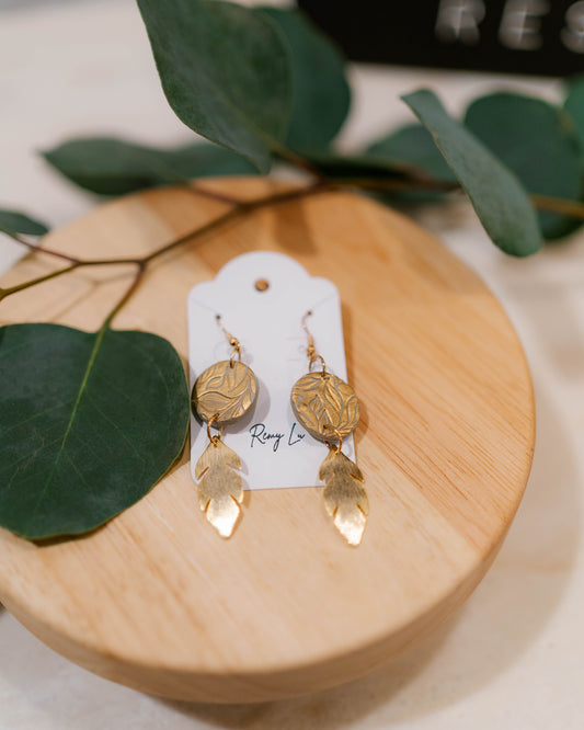 THE AMY | round clay painted gold and embossed with leaves + dangling gold feather